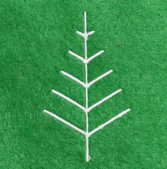A traditional tree shape with branches getting smaller towards the top of the tree. Its stitched in white thread on a green background.
