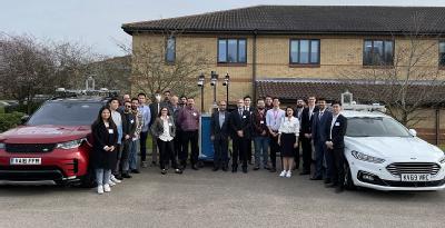 Group picture of researchers who developed technology solutions to enhance the safety and efficiency of connected and autonomous vehicles in complex road junctions