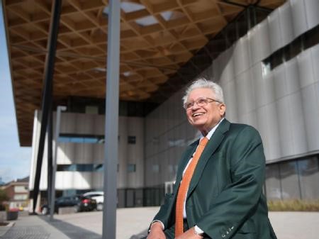 The Late Professor Lord Bhattacharyya with his building at WMG, University of Warwick