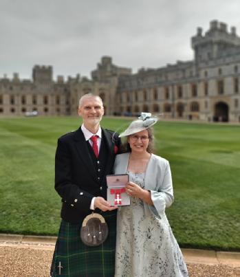 Picture of Professor Margaret Low with her husband Robert Low at Windsor Castle