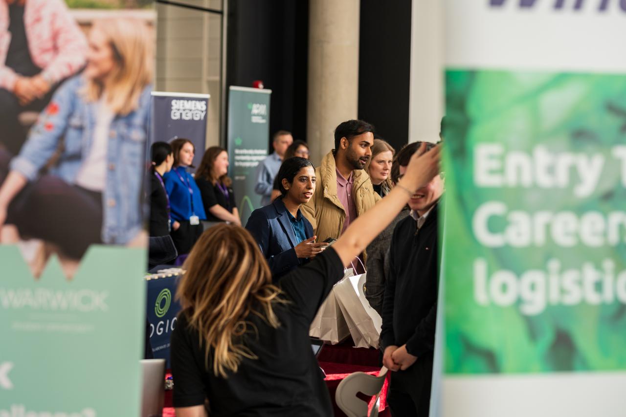 Photograph of student at careers fair 