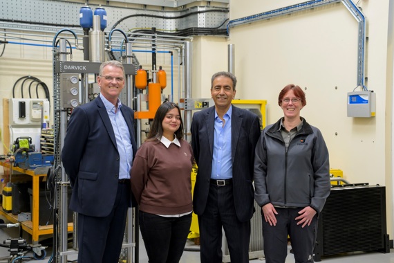 people standing in a factory