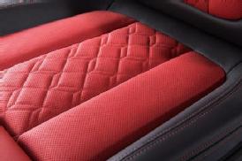 Red leather car seat. 