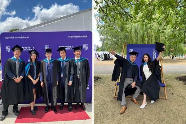 Graduates pose in black caps and gowns with sky-blue hoods