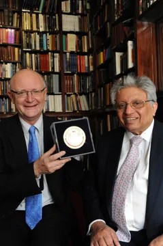 Professor Nigel Thrift, Vice-Chancellor of the University of Warwick and Professor Lord Kumar Bhattacharyya, Director and founder of WMG, with the Queens Anniversary Prize Medal