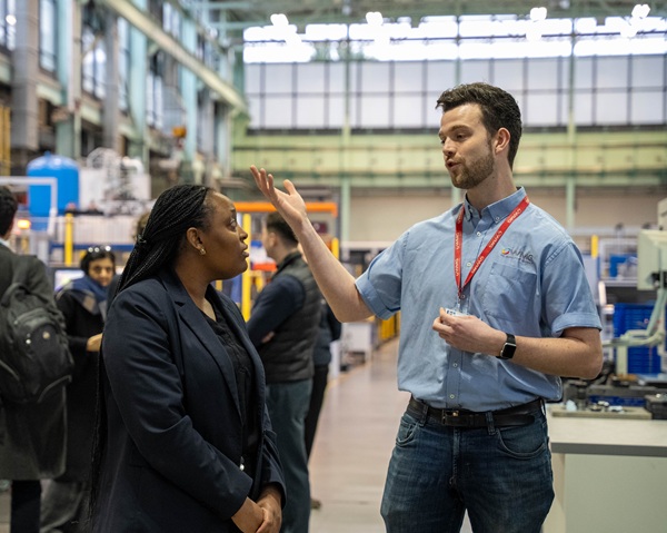 Taiwo Owatemi MP with WMG's Zach Parkinson in the IMC Engineering Hall