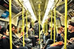 Image of grab rails on tube train