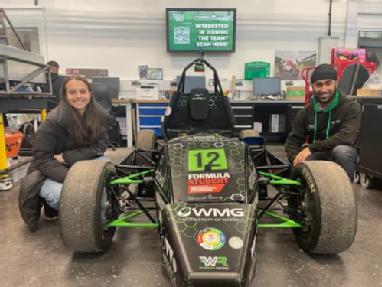 Picture shows members of the Warwick Racing team with the Formula Student race car