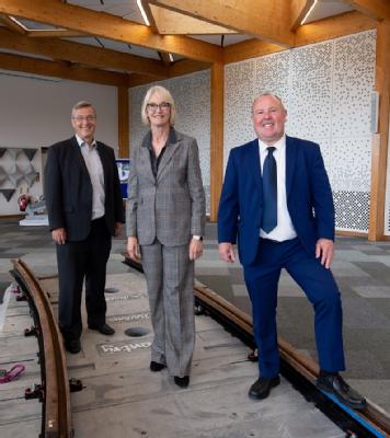 Pictured left to right: Stuart Croft (Vice Chancellor, University of Warwick) Margot James (Executive Chair, WMG), and Councillor Jim O’Boyle (Cabinet Member for Jobs, Regeneration and Climate Change, Coventry City Council), stand on the new Coventry VLR track form.