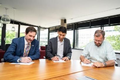 Pictures shows left to right: Professor David Greenwood, CEO WMG centre HVMC; Kedar Munipella Global CEO TAE; Richard Moore, General Manager E-mobility TAE