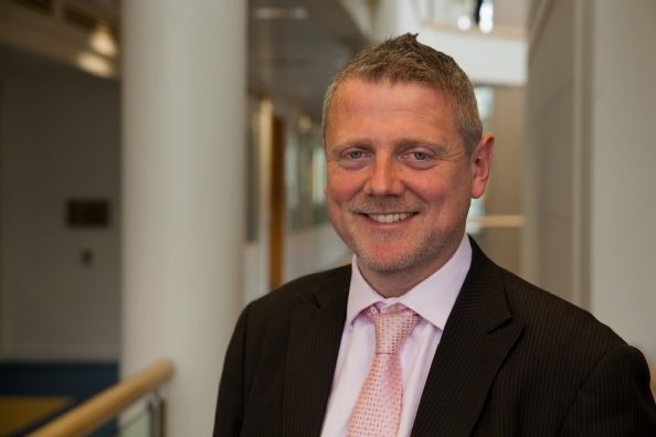 Kerry Kirwan, the new Dean of WMG, smiles to camera