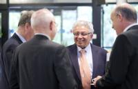 Professor Lord Bhattacharyya greets Royal Society delegates