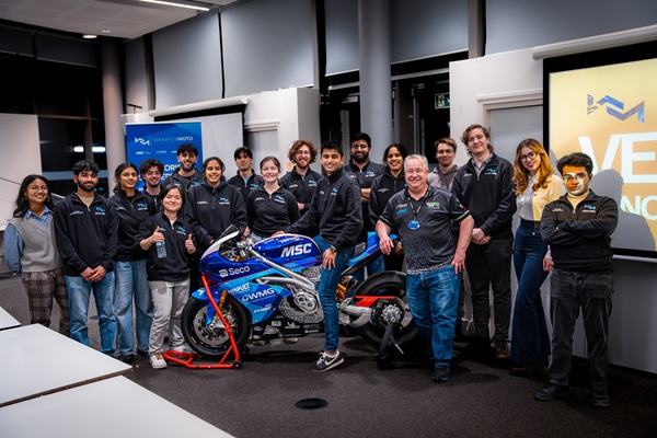 Warwick Moto students and staff at the Veloris Concept launch, stood with the Veloris concept bike