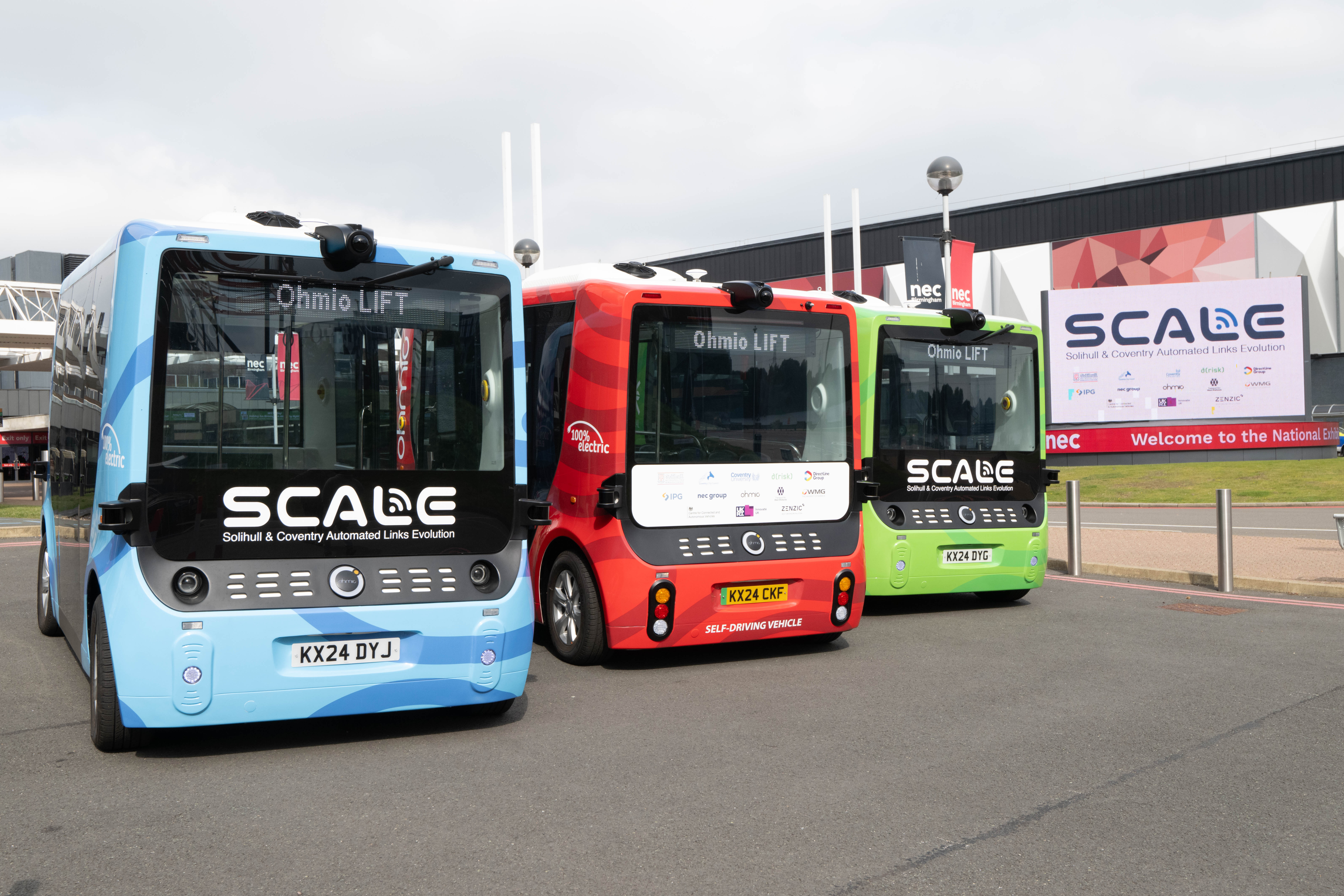 SCALE multicoloured buses promotional image