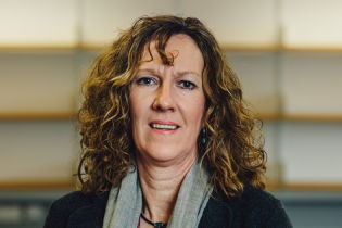 Alison Morgan photo - woman smiling with red/brown hair