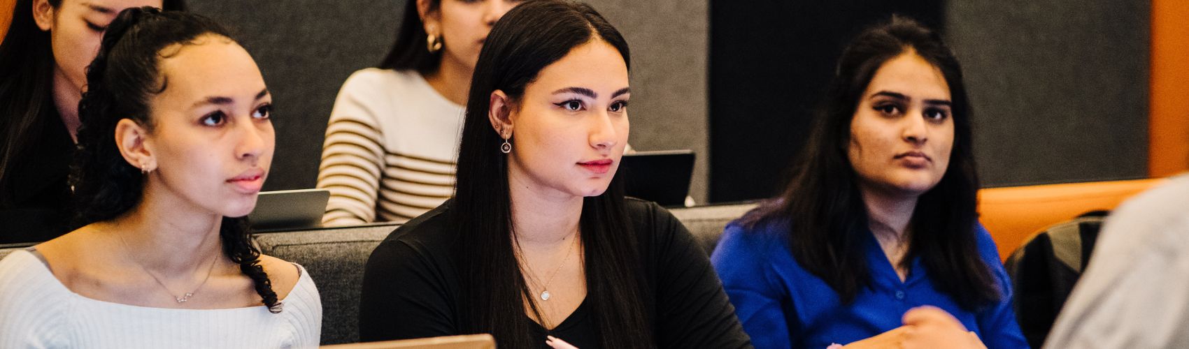 a group of people sitting in a room