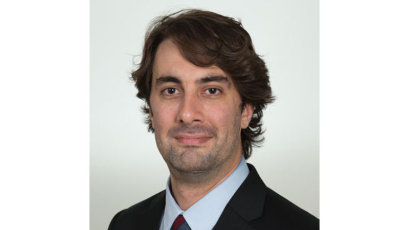 white male in a blue shirt
