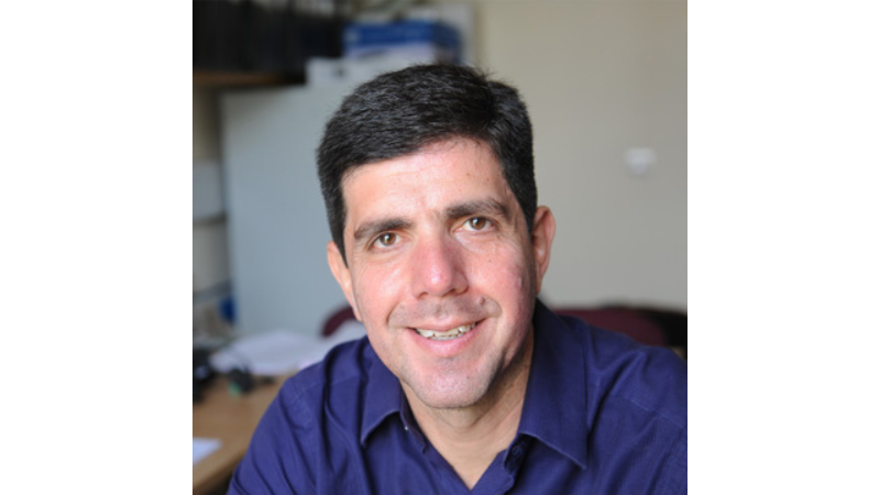 white male in a blue shirt