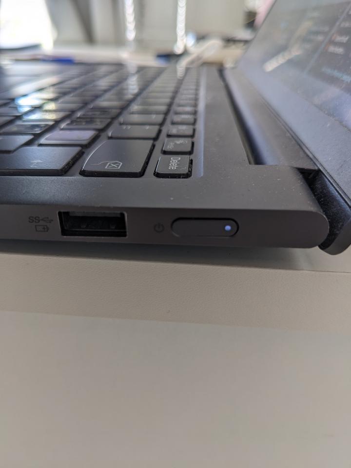 Power (On and Off) button on laptop side