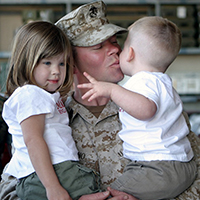 soldier with 2 kids