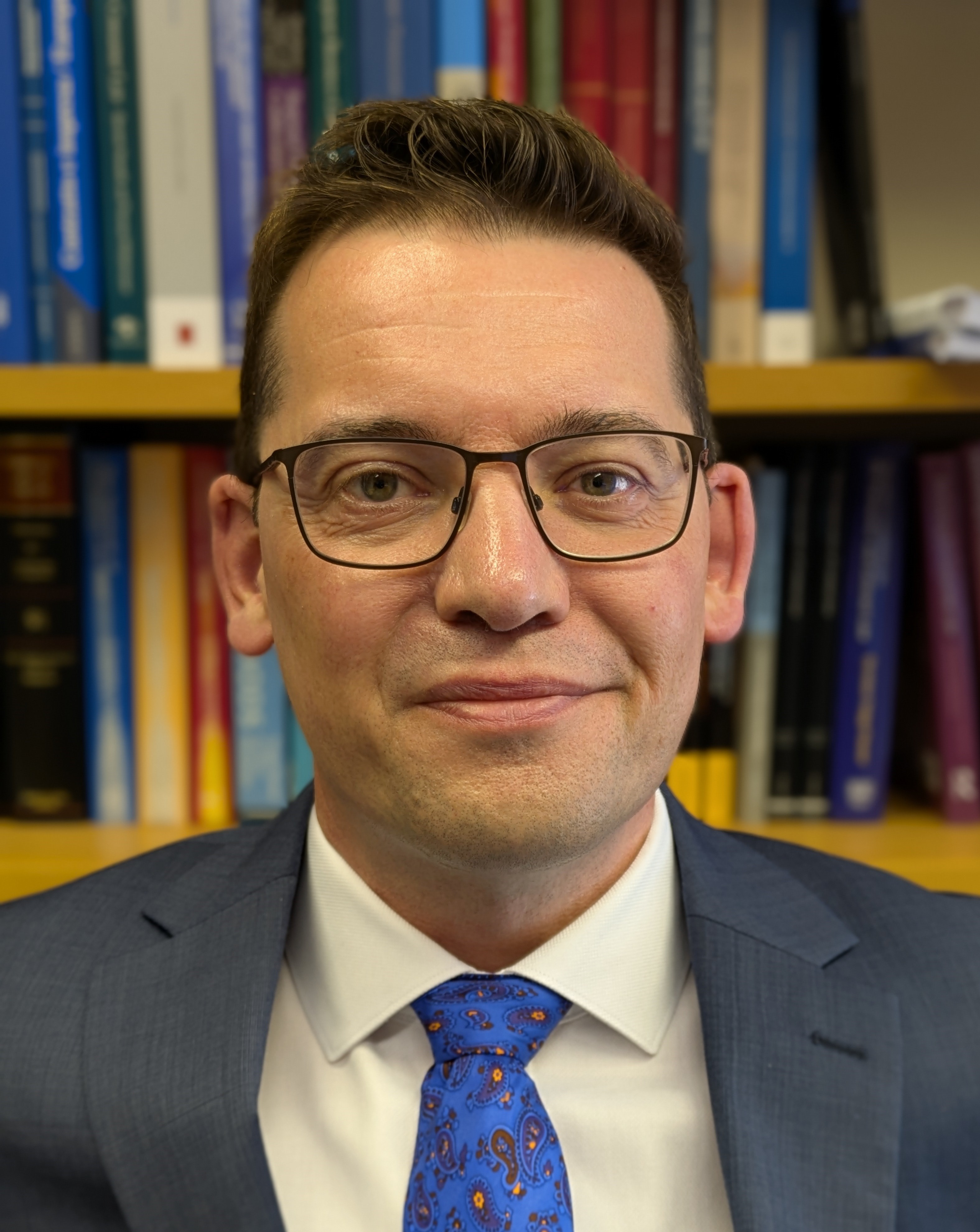 Picture of Christian Twigg-Flesner in his office taken in July 2025