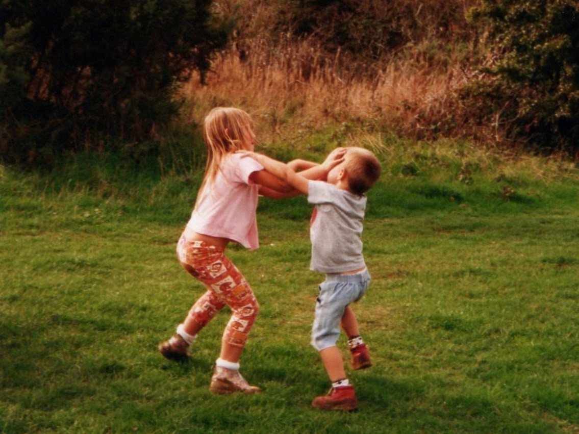 Kids play fighting