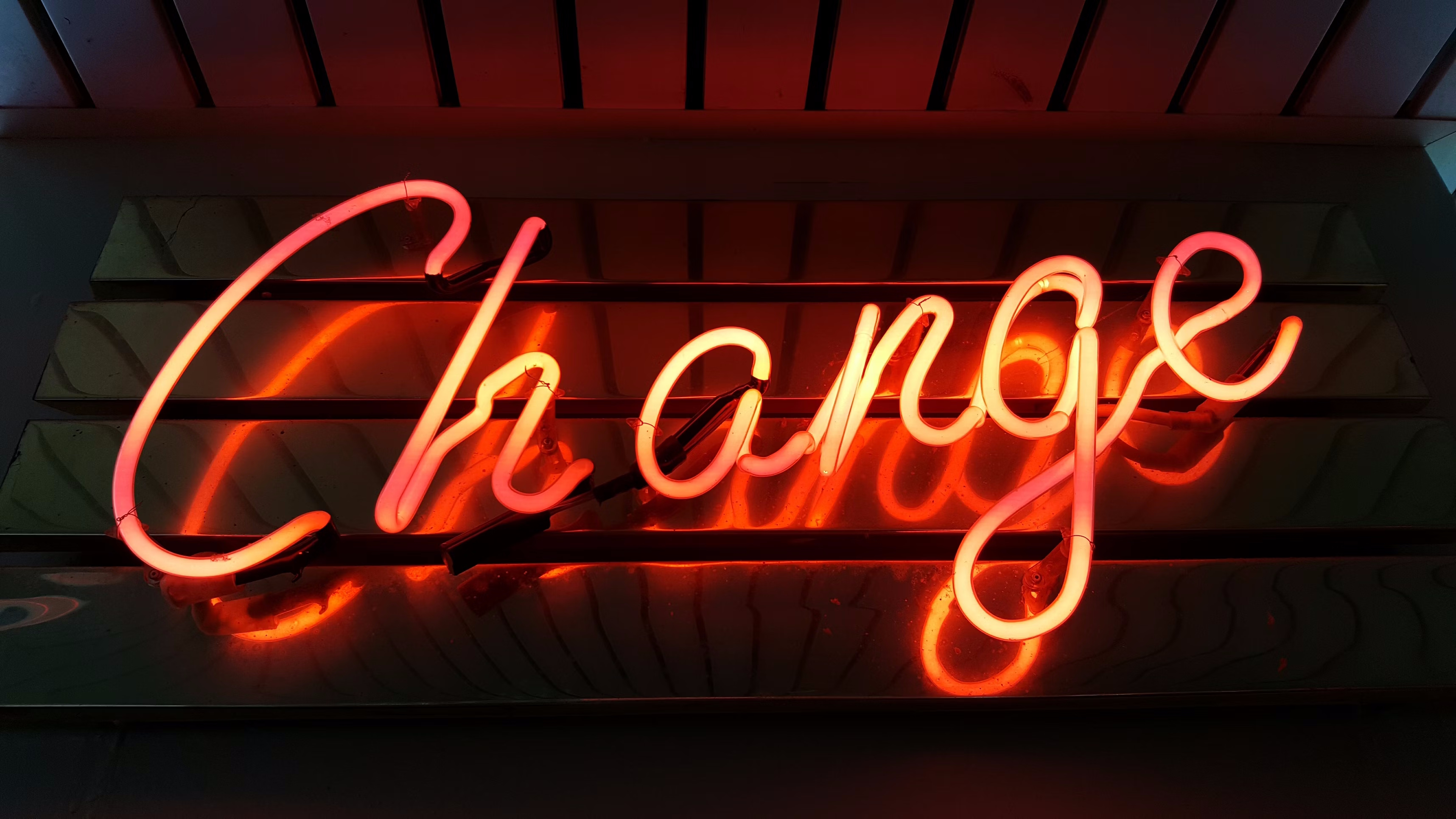 Neon sign with the word change