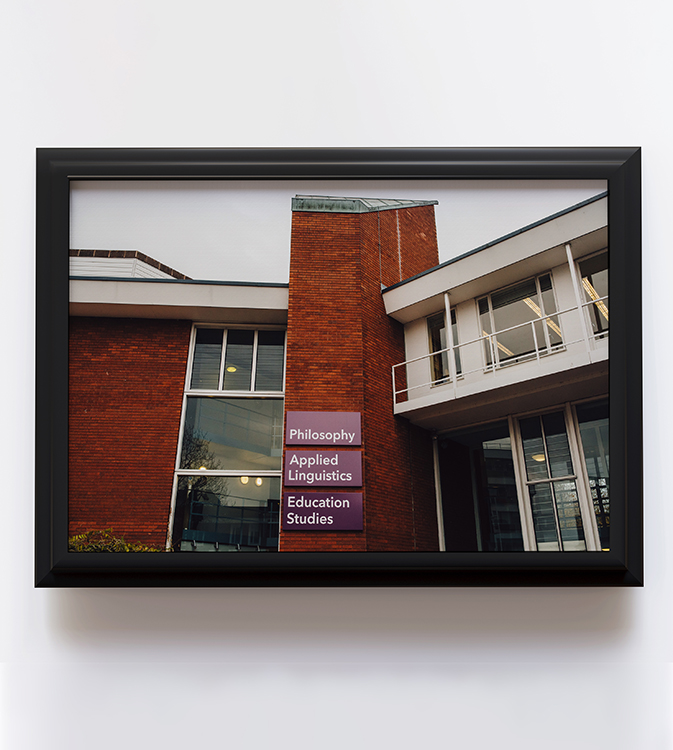 Outside of Social Sciences Building with dept signage