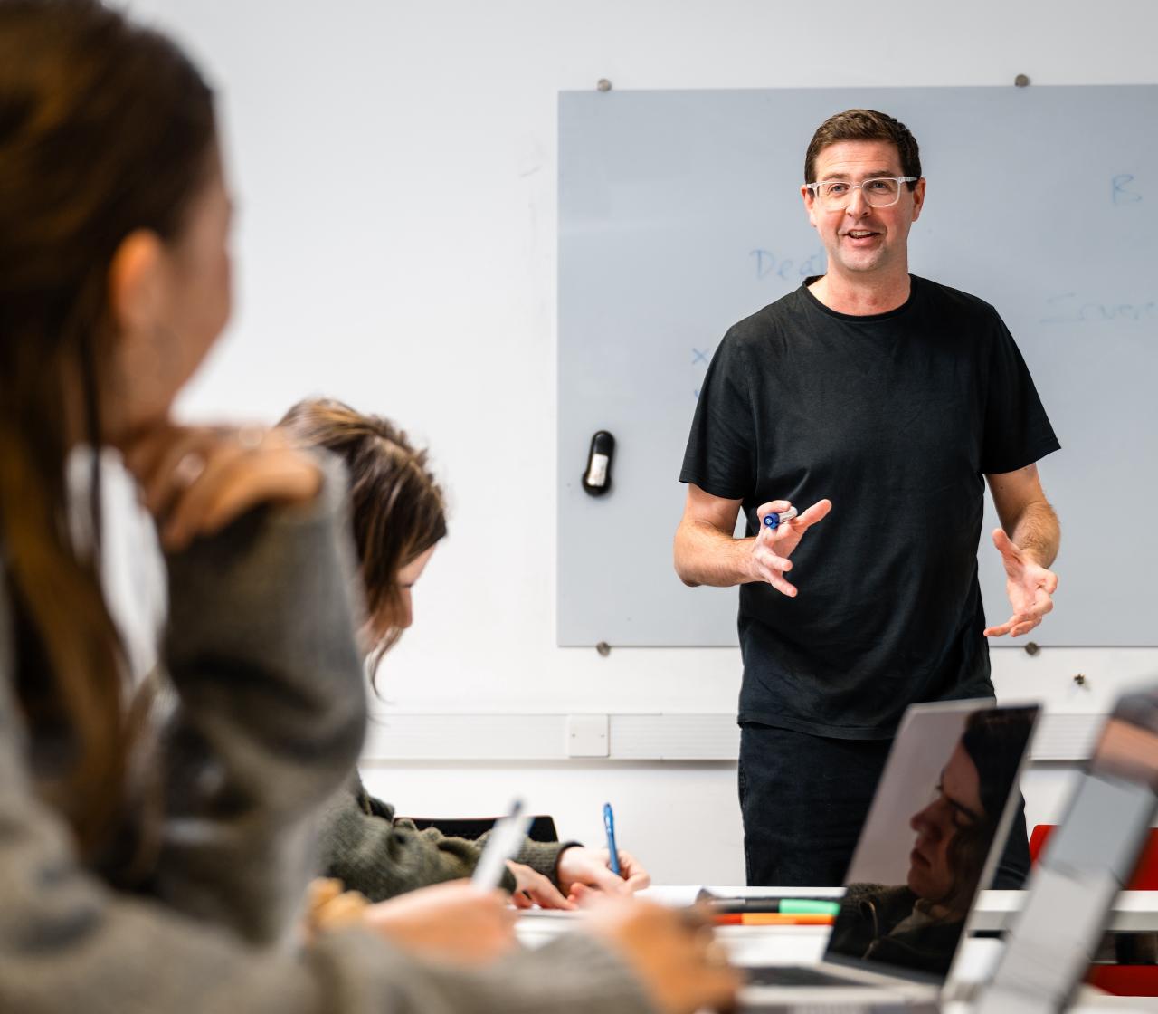 lecturer talks to student