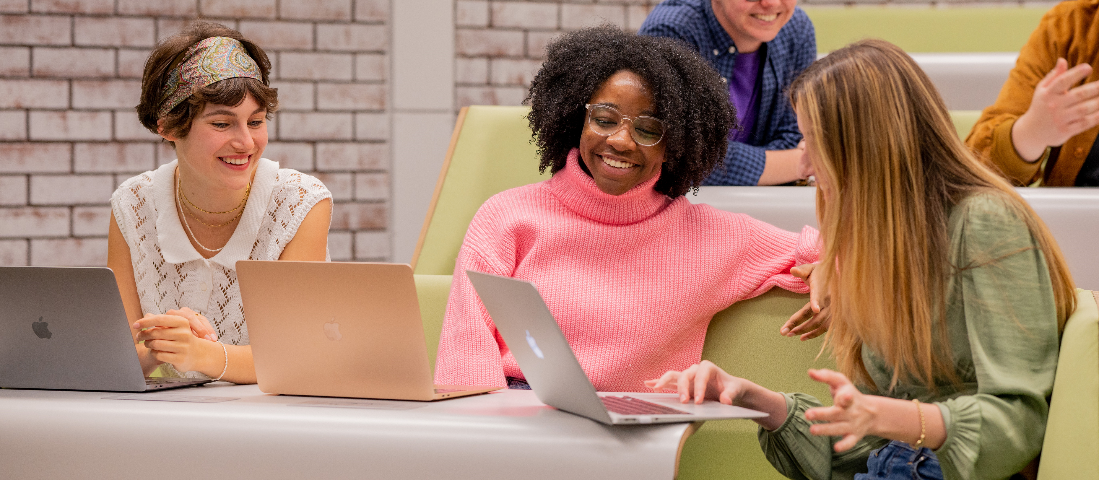 students with laptop
