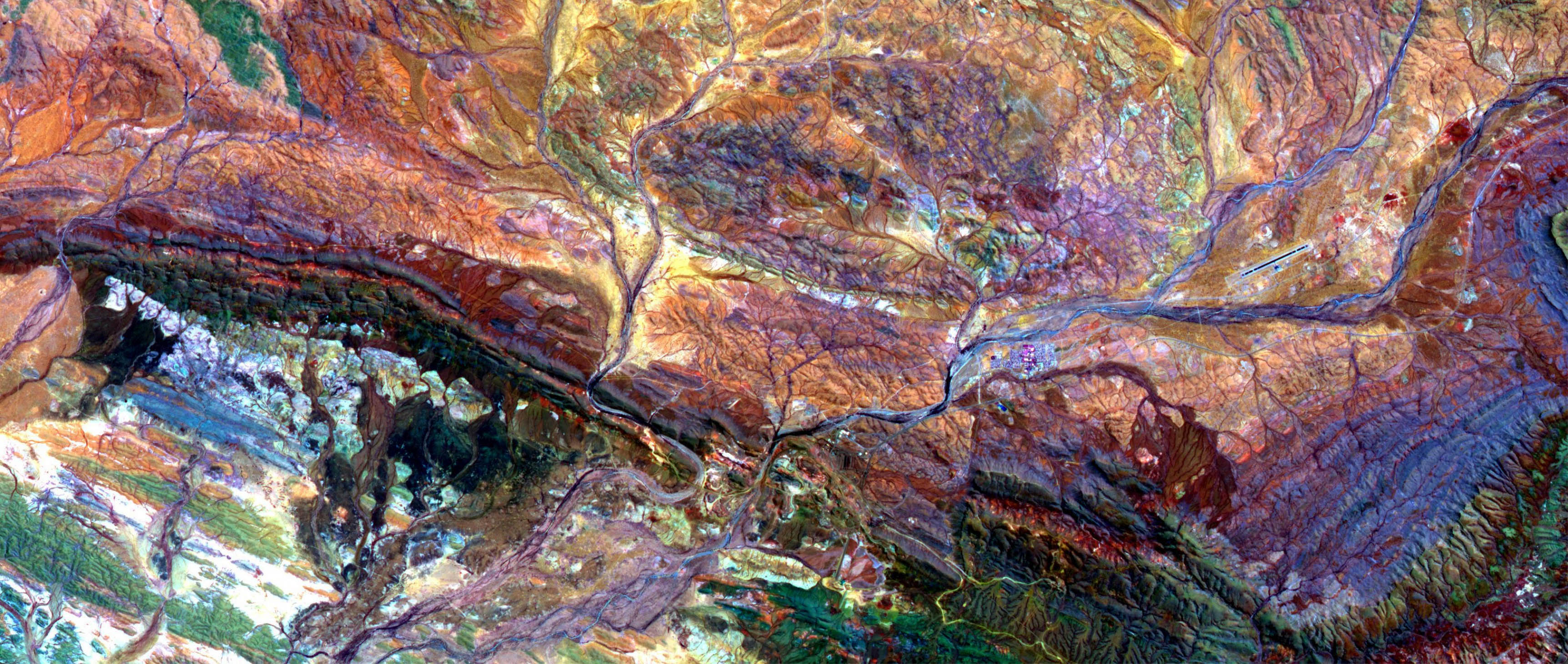 NASA – The Pilbara in northwestern Australia exposes some of the oldest rocks on Earth, over 3.6 billion years old.