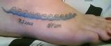 Chantelle Le Guilcher: Chantelle's stylised wave tattoo was a gift from her parents to celebrate her Round Jersey and Jersey to France swims.