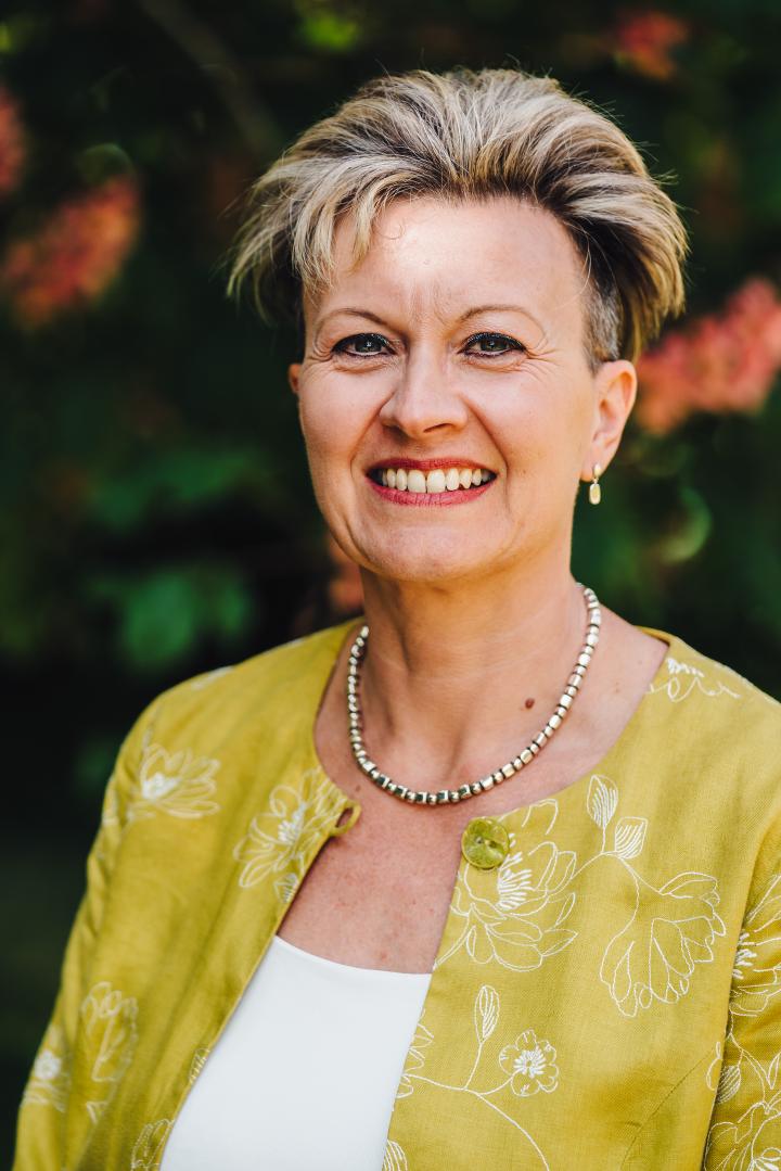 Professor Nina-Anne Lawrence smiling to camera
