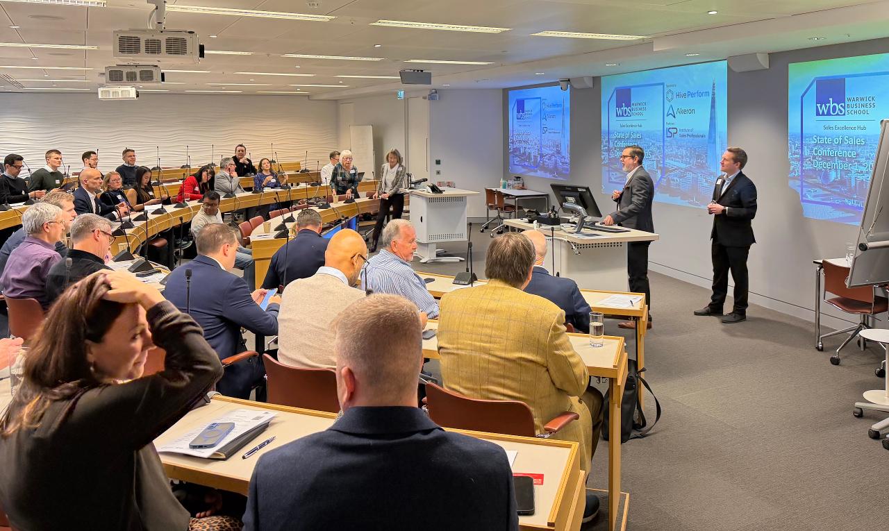 Sales leaders and researchers attending a State of Sales Conference presentation.