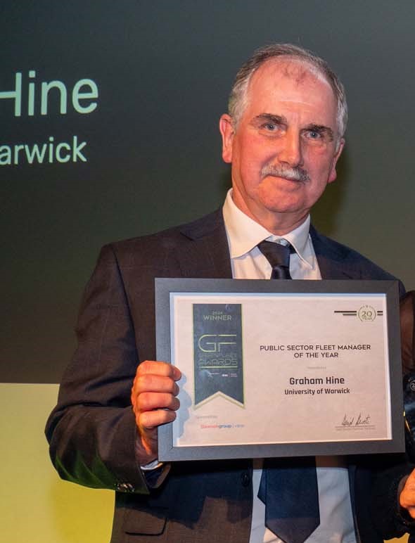 Image of Graham accepting his award