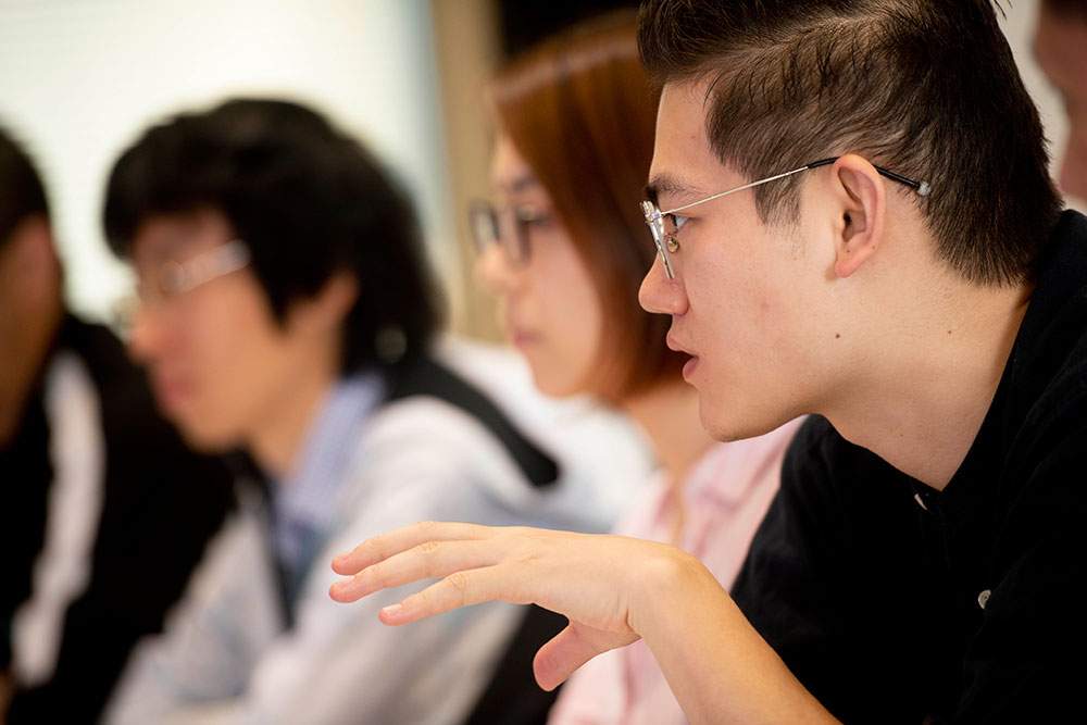 Attendees take part in the language workshop at the Interdisciplinary Postgraduate Conference