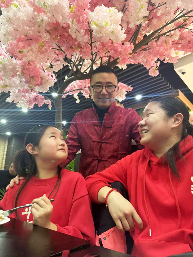 Jianhua with his family
