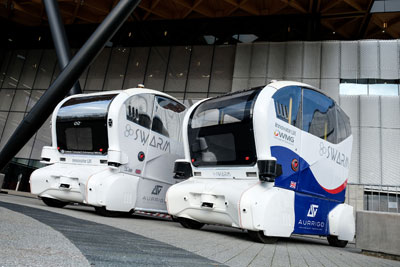 Driverless pods outside the Lord Bhattacharyya Building