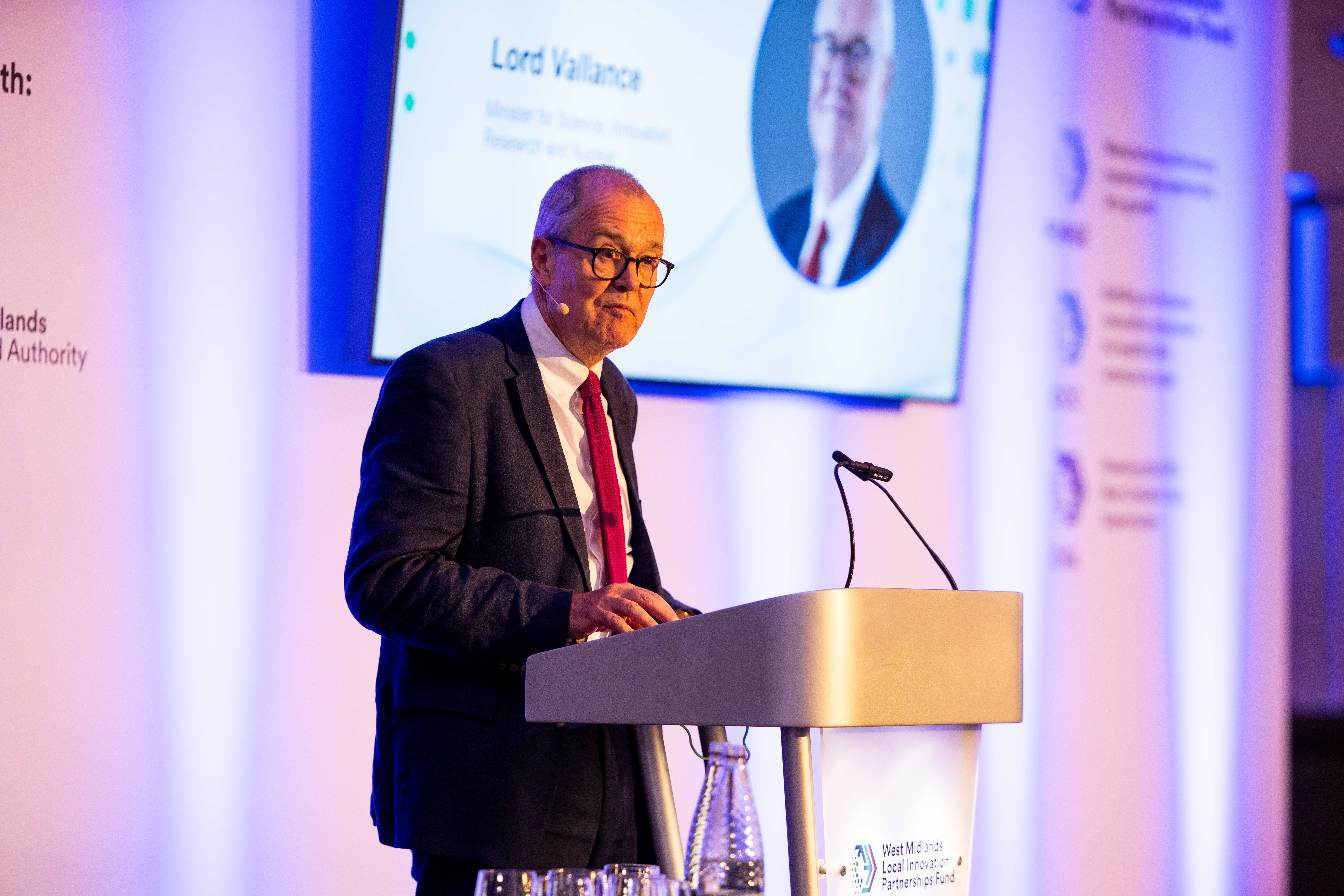 Minister Patrick Vallance delivering keynote remarks