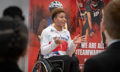 Kare Adenegan answers questions from Bablake and King Henry VIII School pupils. 