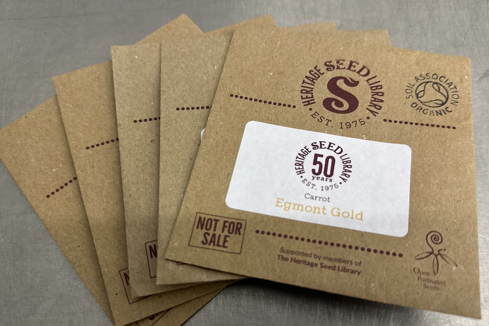 brown paper packets of seeds