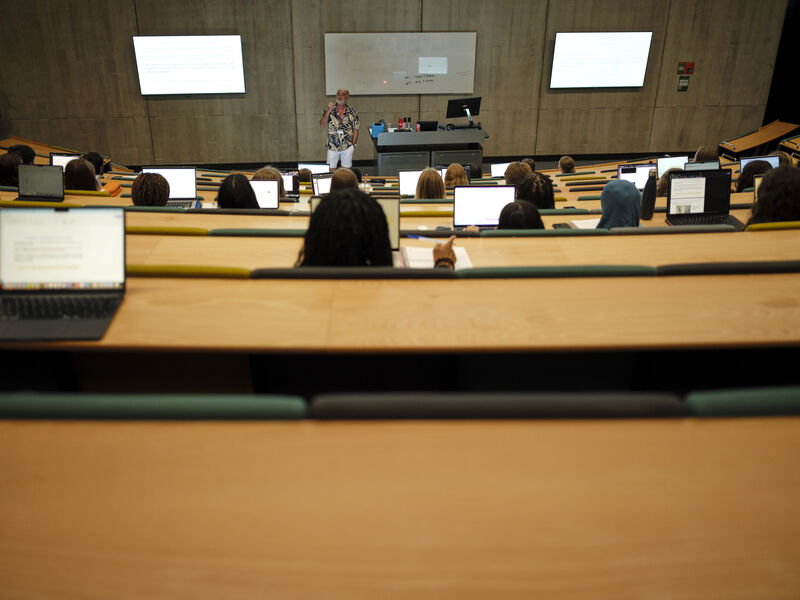 Image of students listening to a lecture in a lecture theatre