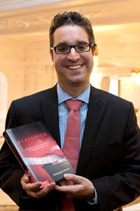 Dr Moran with book