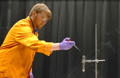 Professor Baker doing an experiment