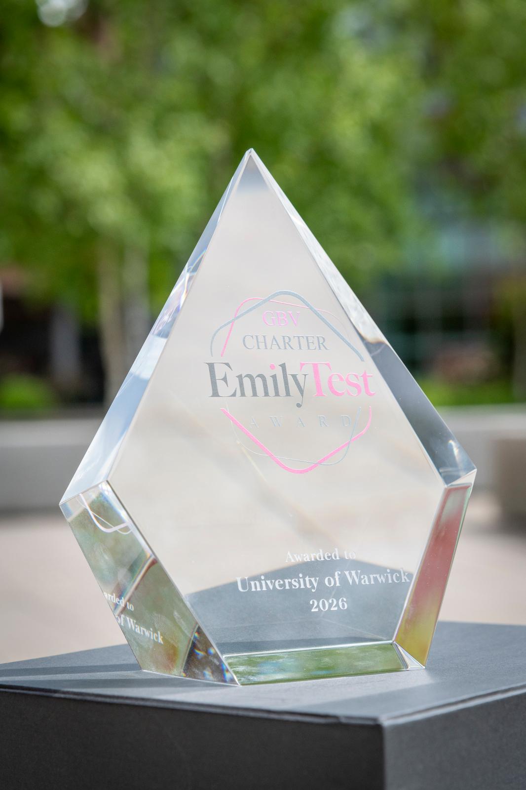 EmilyTest Charter award, a glass award with Warwick's name carved in. 