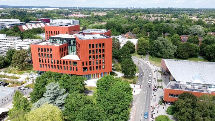 A photo image of the Faculty of Arts Building taken from a drone in the sky