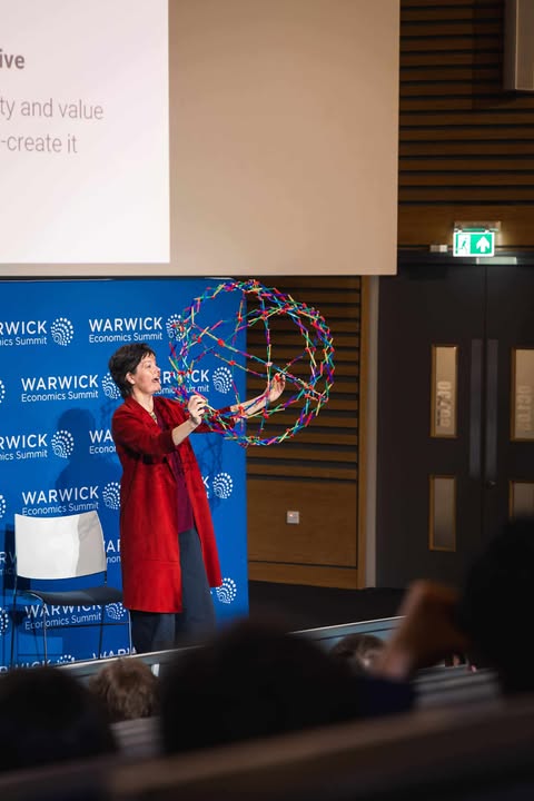Female presenter at the Warwick Economics Summit