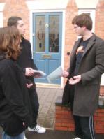 Student Community Rep talking to students