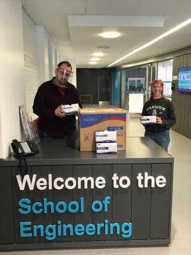 Staff at the University of Warwick's School of Engineering with the face mask delivery from Shanghai