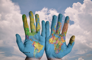 world map on hands